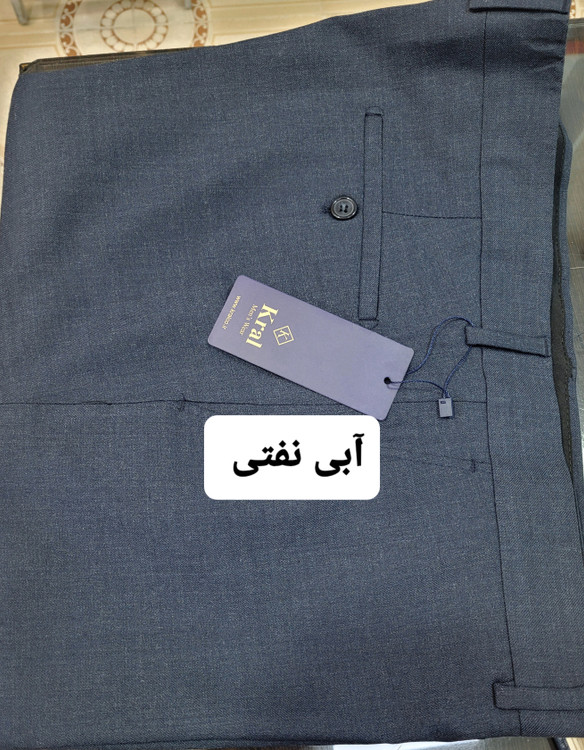 شلوار مردانه کلاسیک پارچهای رنگ آبی نفتی